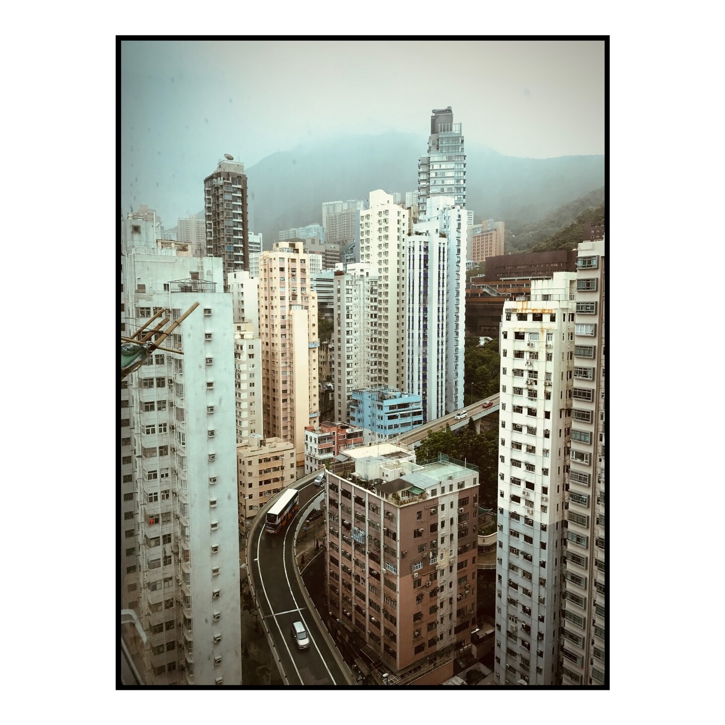 View from a hotel overlooking buildings in Hong Kong