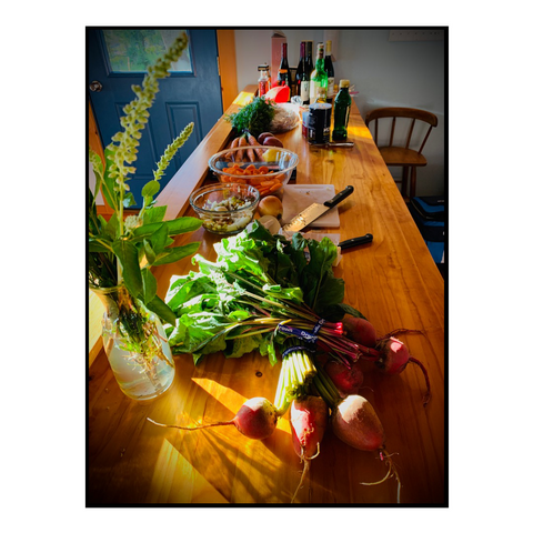 Brightly covered produce on a counter.