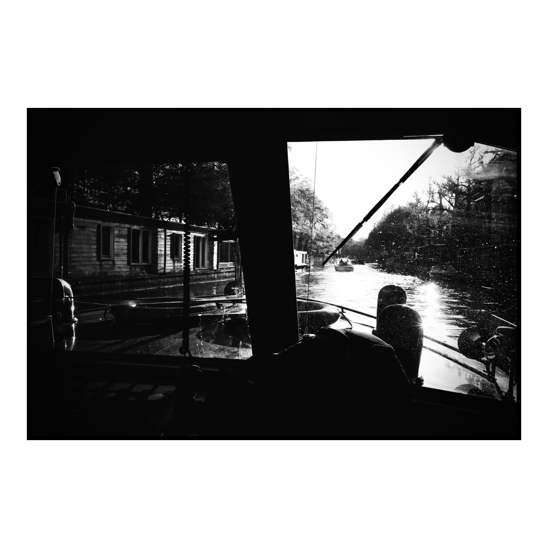 A view from inside a canal boat in Amsterdam.