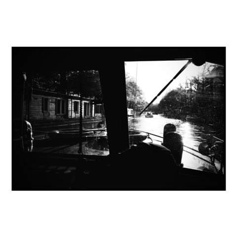 A view from inside a canal boat in Amsterdam.