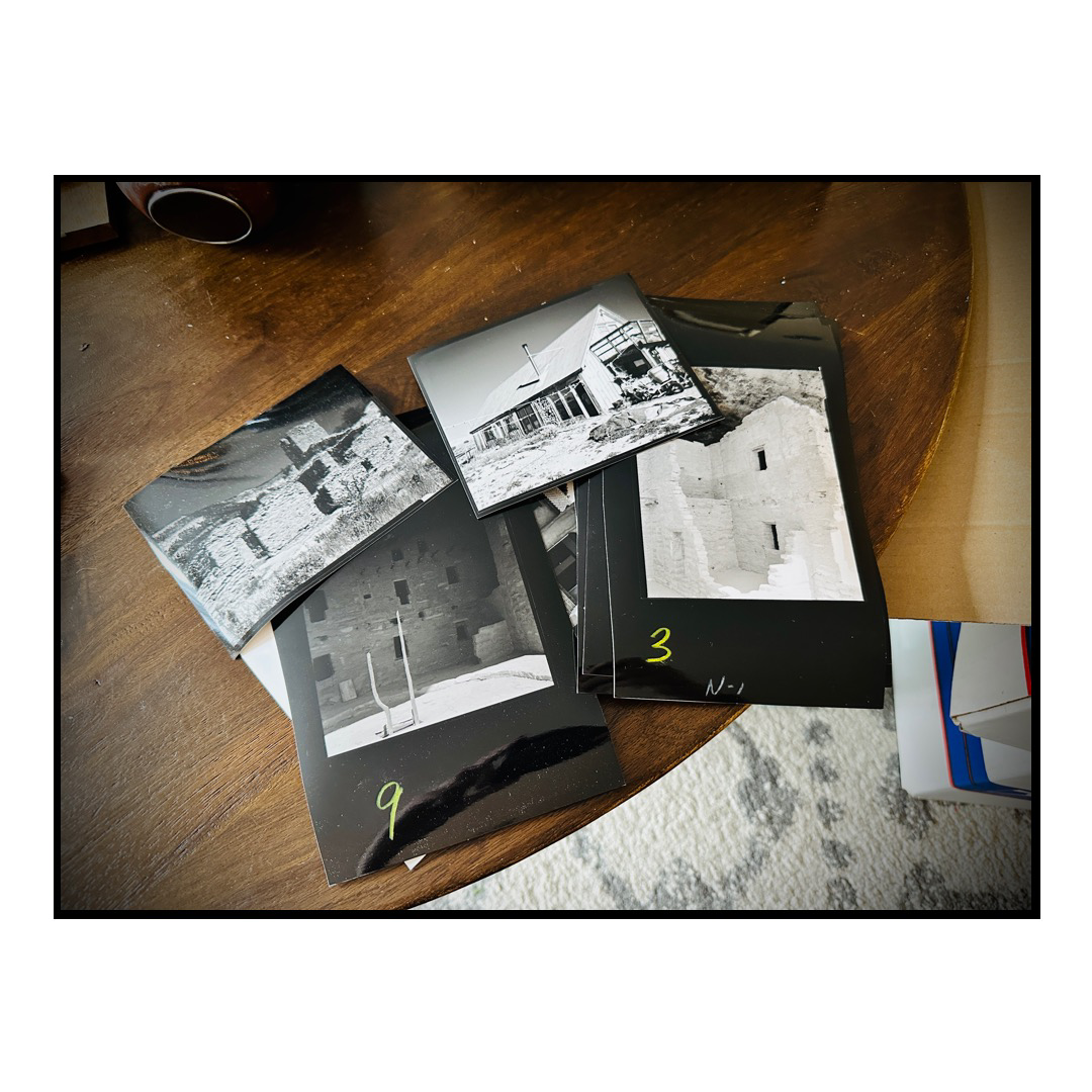 Test prints in black and white on a coffee table