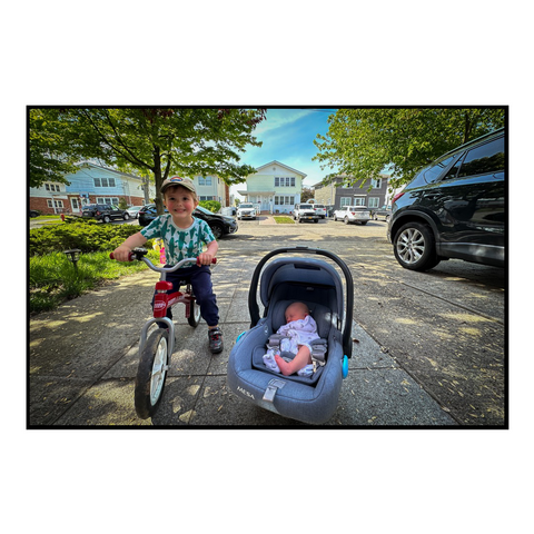 Sim and daughter posing on the driveway.