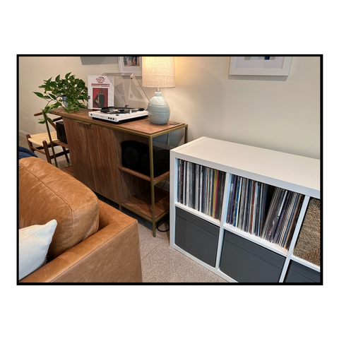 Photo depicting a stereo cabinet with a second shelf for record storage.