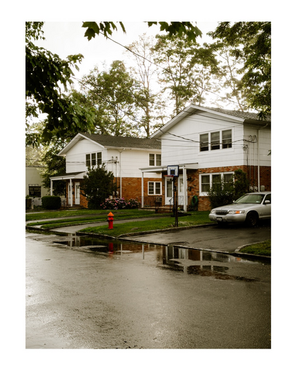 Post rain view of a suburban street